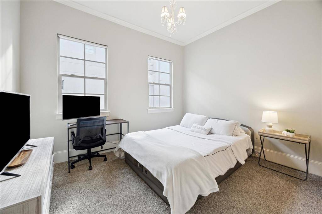 The second bedroom is bright and cheery to welcome your guests.
