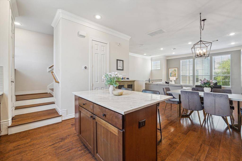 The door straight ahead leads to the powder bath for added convenience.