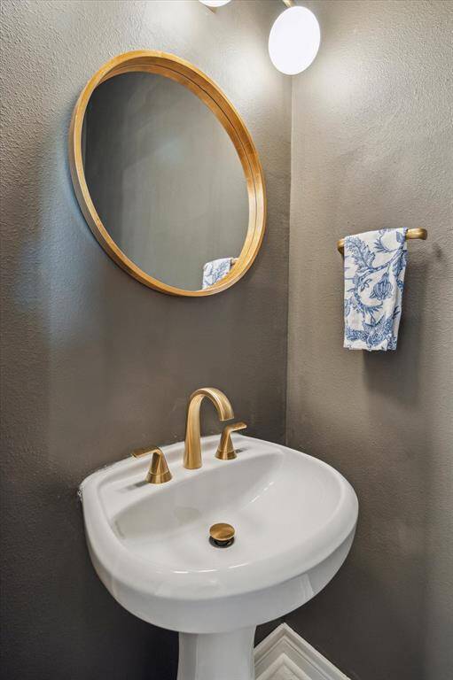 Located on the 2nd floor, off the dining space is a powder bath. Great for guest use when entertaining!