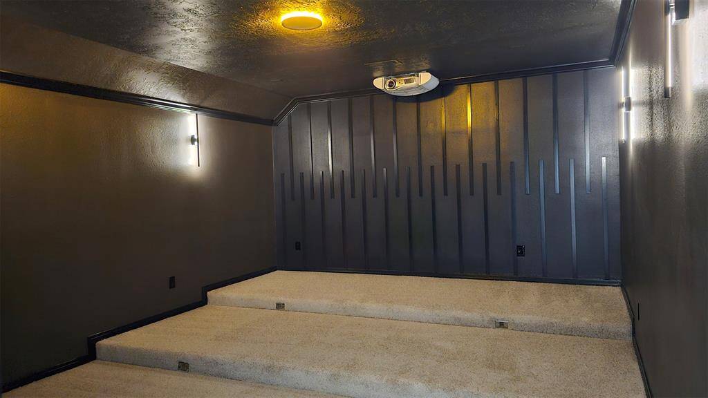 Upstairs movie room has dimmable lights