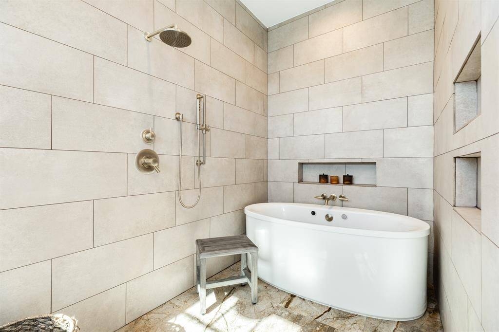 Primary en-suite bath Wet room has soaker tub and shower