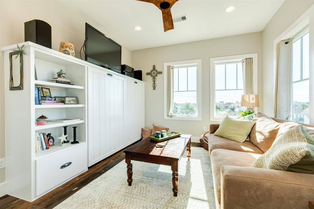 Bedroom 3 functions as den with a Queen size Murphy bed