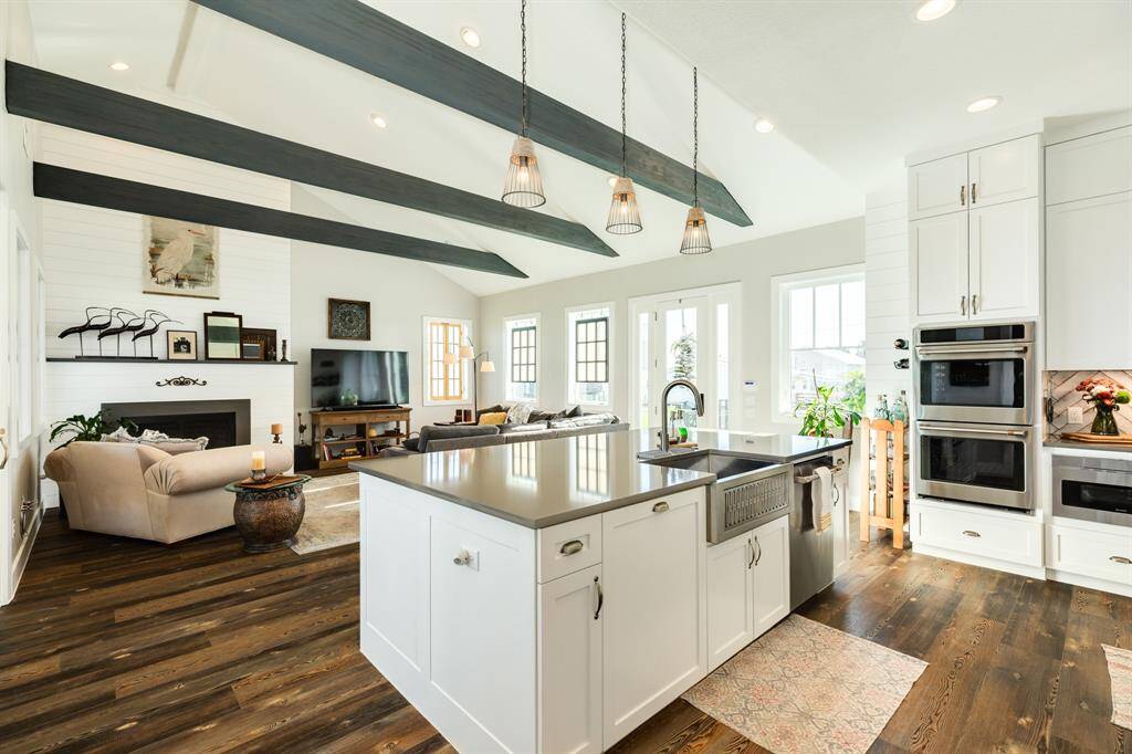 DOUBLE OVEN, MICROWAVE and FARMER'S SINK. Open concept from kitchen to living room.
