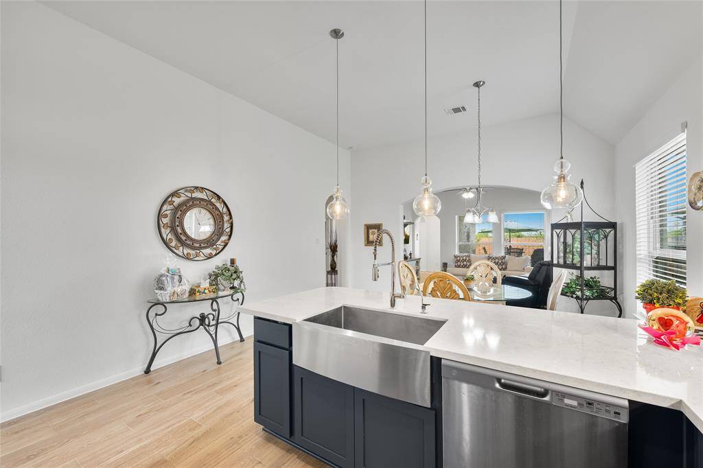 The kitchen is open to the living and dining areas to keep conversation flowing while meals are prepared.