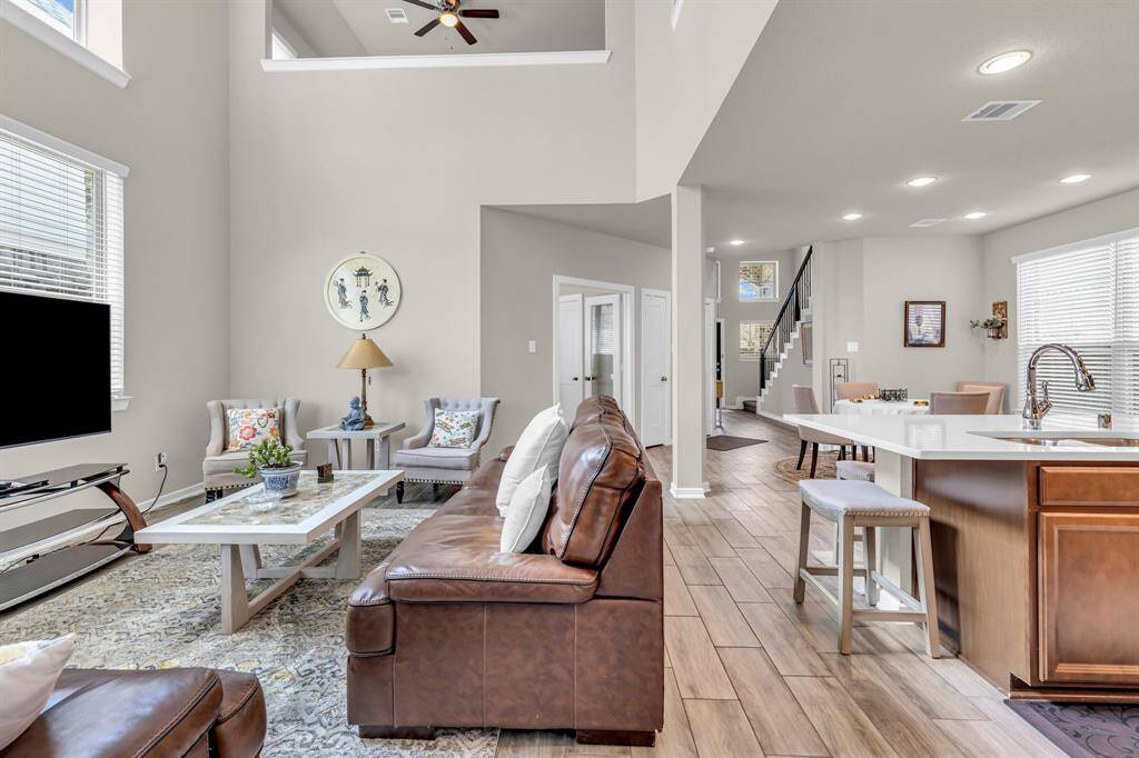 View from the living room showing how open the dining area and kitchen are.