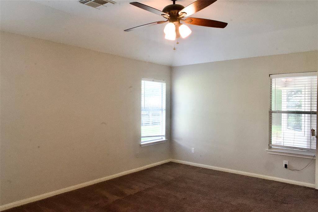 Primary bedroom with natural light