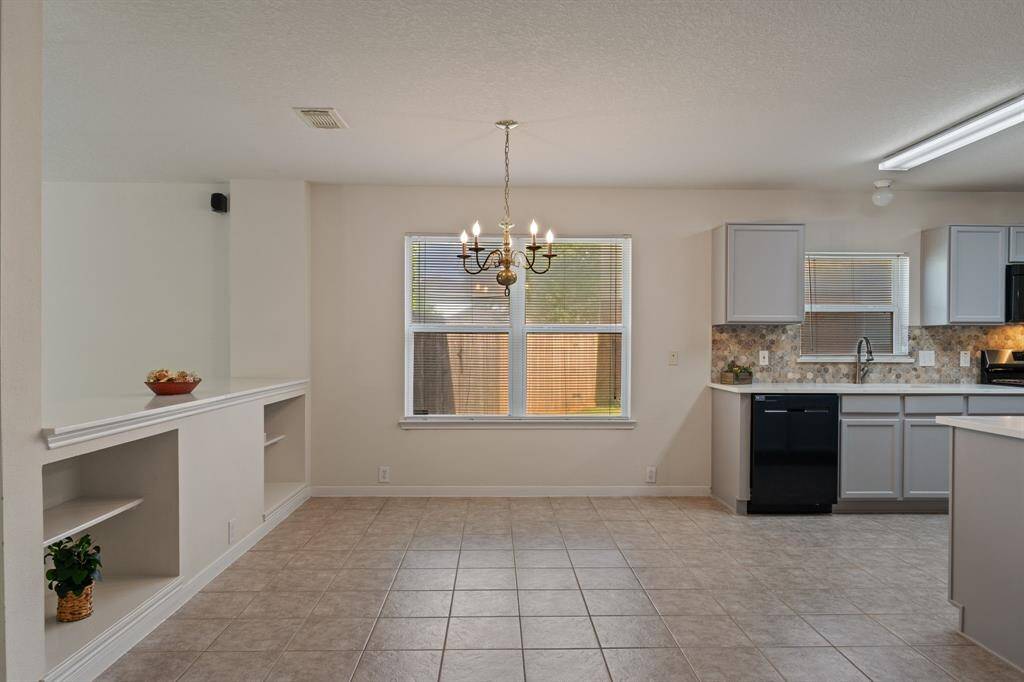 This perfectly designed open concept blends the living room, dining area, and kitchen perfectly.