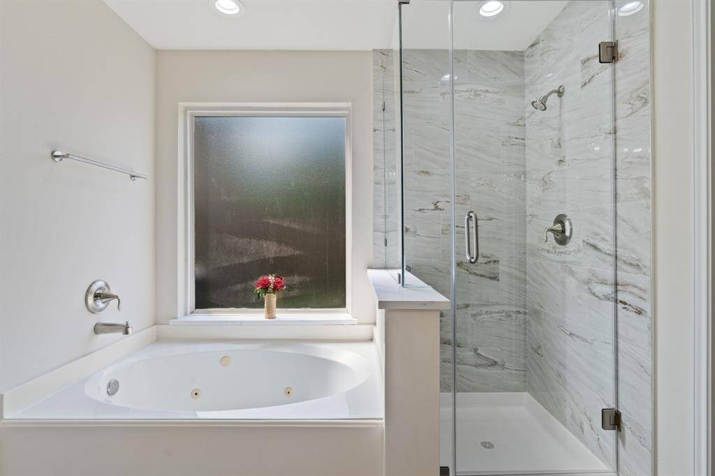 View of tub and shower.