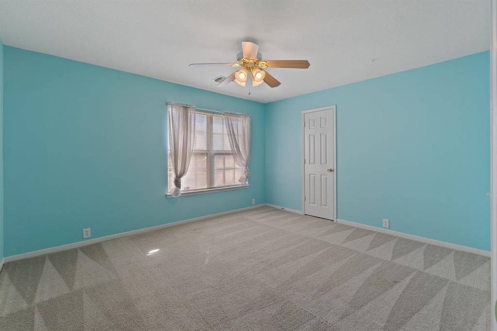 One of the upstairs bedrooms.