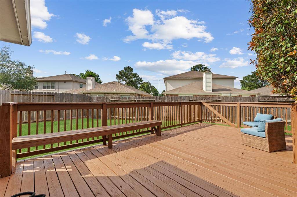 Relax on the beautiful deck by the pool.
