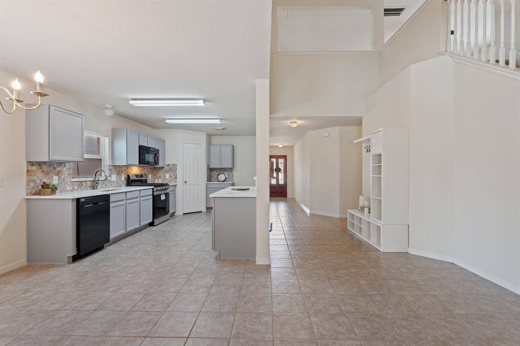 View of fully remodeled kitchen and dining area.