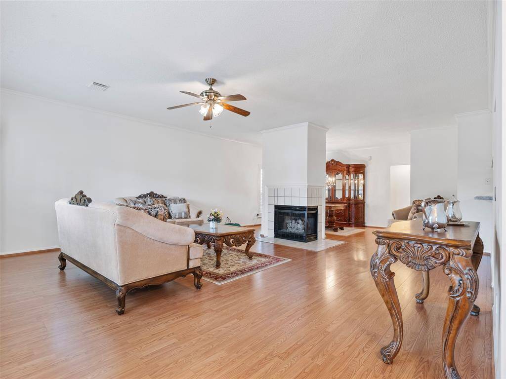 Love the openness with a half wall between the family room and dining room.