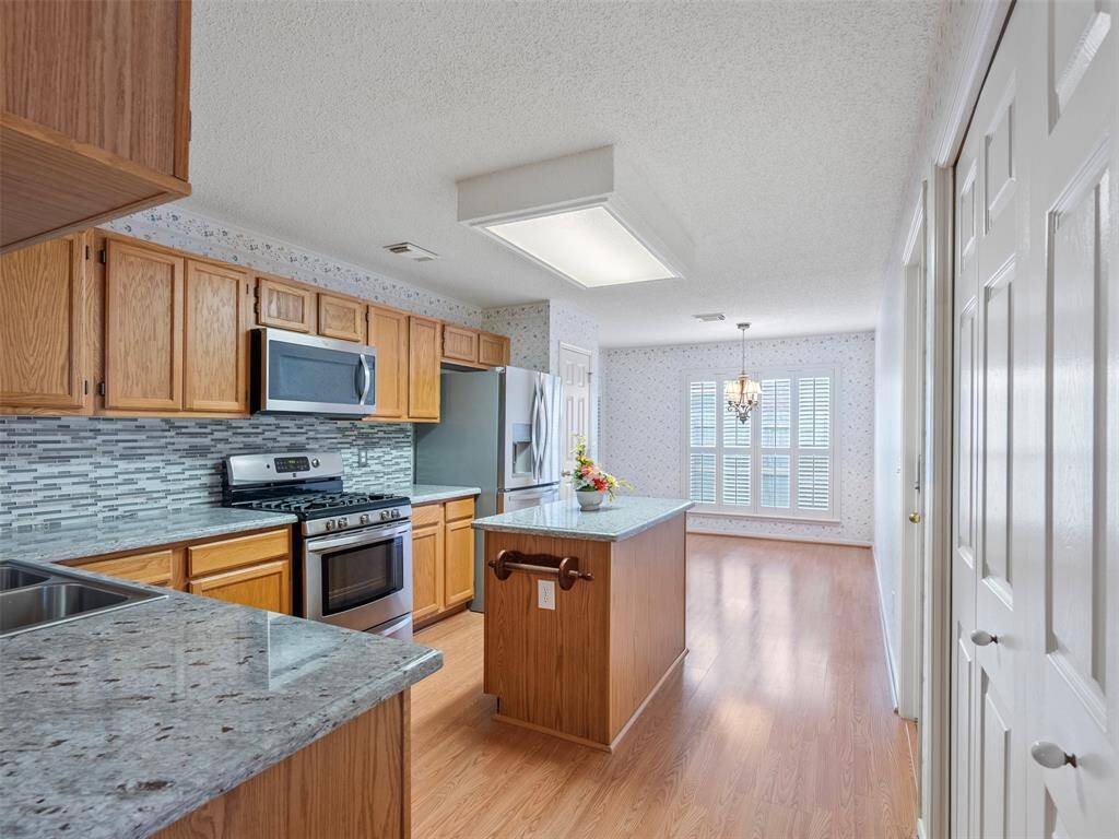 Island Kitchen with lots of cabinets.