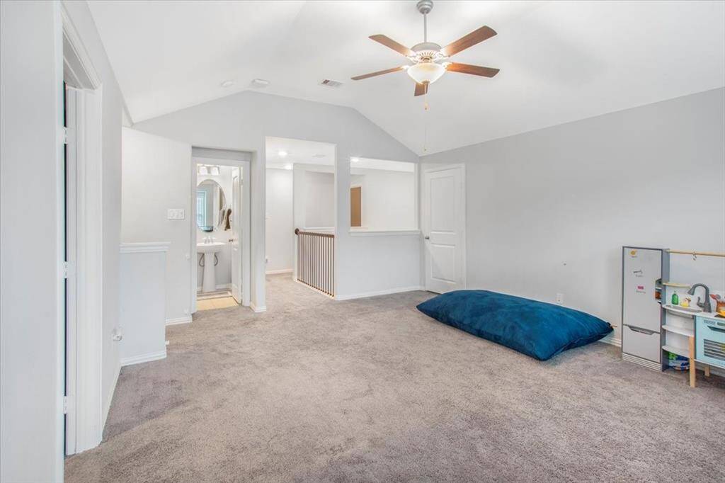 Spacious upstairs game room offers a verstatile second living area for play and relaxation.
