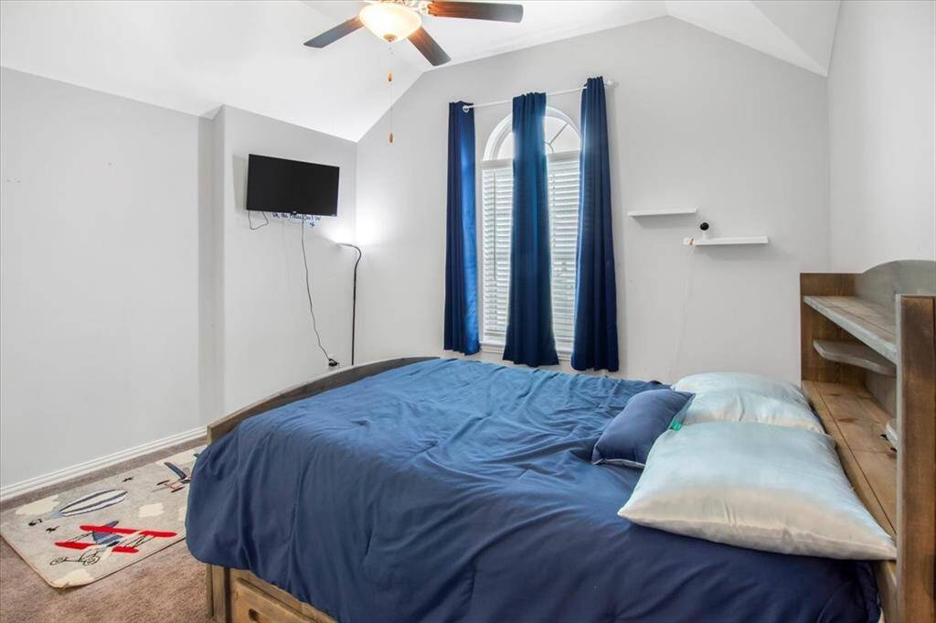 Bright and versatile third bedroom on the second floor connected to the jack-and-Jill bathroom.