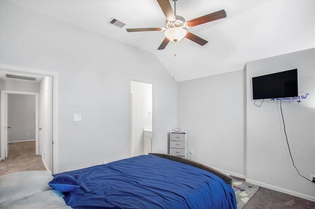 Bright and versatile third bedroom on the second floor connected to the jack-and-Jill bathroom.