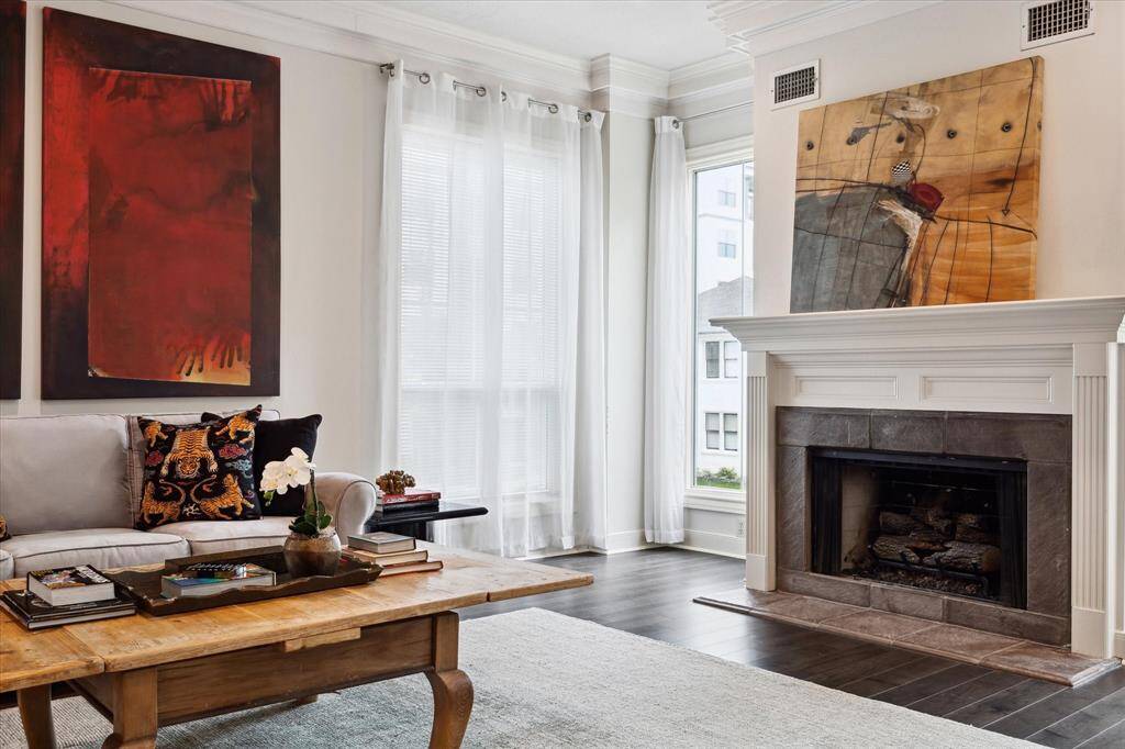 The living room has a warm and inviting atmosphere. All the windows in the home (except one bathroom window) have recently been replaced.
