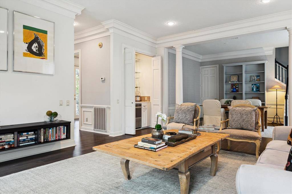 A neutral color palette enhances the inviting atmosphere of the open living areas.
