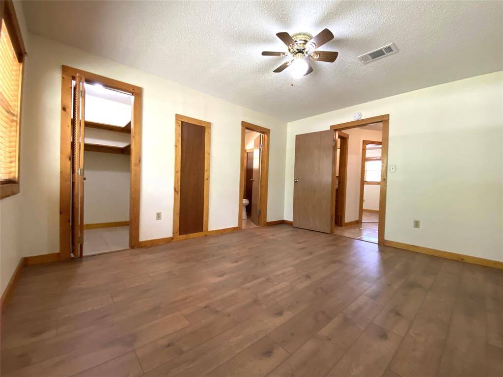 Another view of the primary bedroom.