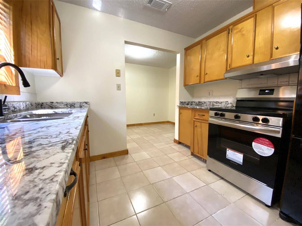 From the kitchen looking to the breakfast area.