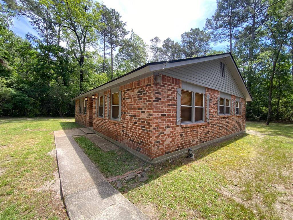 Right side of the home looking to the front of the home.