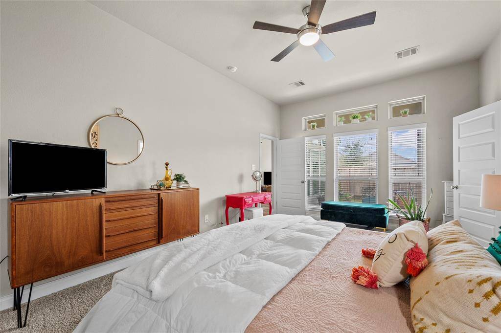 The primary en-suite bathroom is equipped with a stand up shower, soaking tub, double sinks, and a large walk-in-closet.