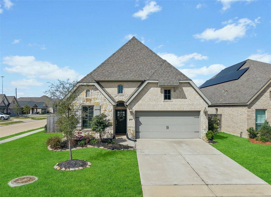 Welcome home to 19803 Blue Roan Drive!