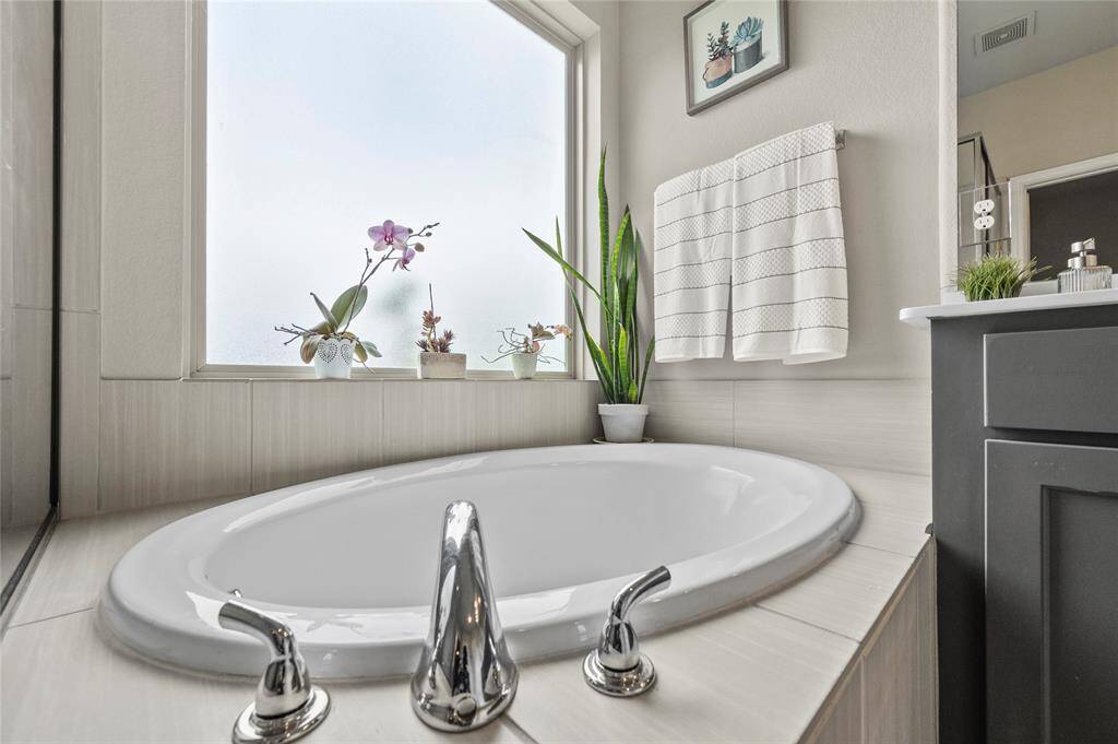 The primary bathroom features a large walk-in-closet for plenty of storage!