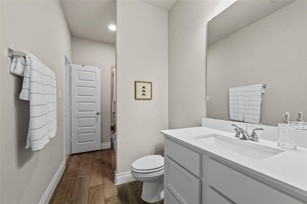 Bedroom 3 is across from the living room and features a large walk-in-closet.