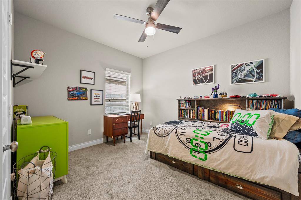 Bedroom 4 is across from the living room and features a large walk-in-closet.