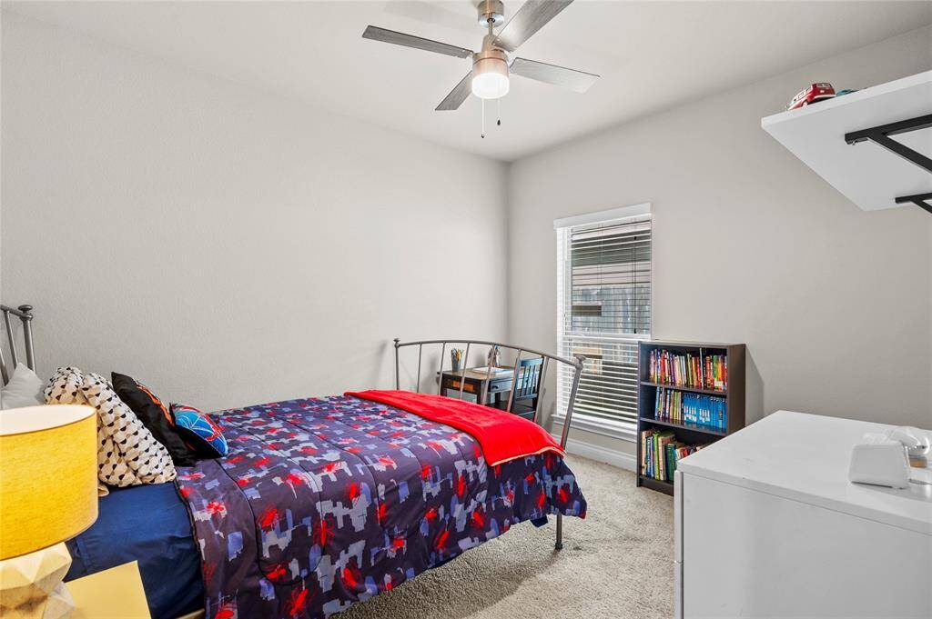 The laundry room is adjacent to the Jack-and-Jill bathroom and bedrooms 3 & 4. It offers a great amount of space and a door to close this area off when needed.