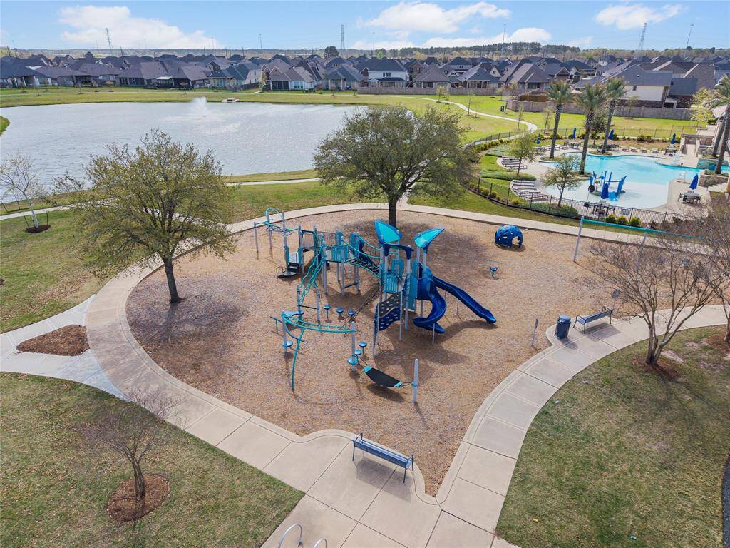 Amira has every amenity you could want -a clubhouse with a fitness room, children’s reading nook, kitchen, yoga studio and onsite HOA – Sterling Management. A beautiful courtyard that offers lake views from shaded patios featuring flat-screen televisions. A gorgeous pool that offers separate areas for adults and children. A dog park. Pickleball courts. Playgrounds. And plenty more!