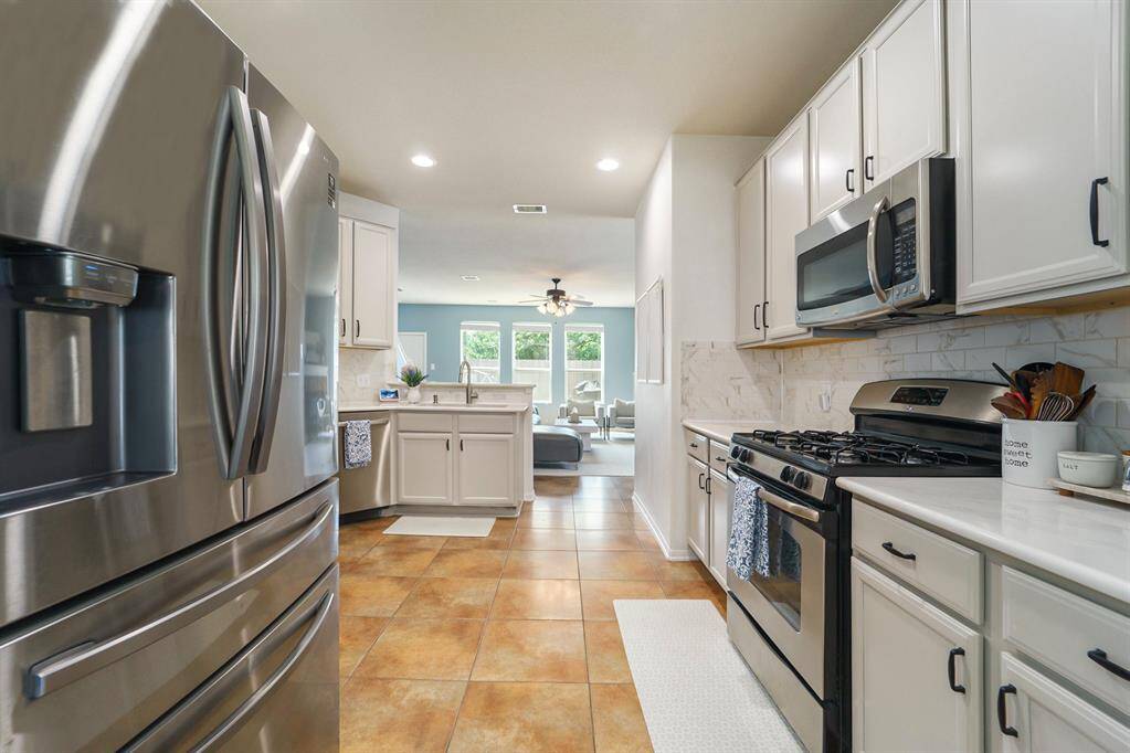Kitchen cabinets recently painted.