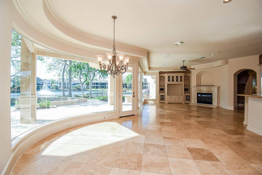 Open living area tying in the kitchen, family area and casual dining area.  All with majestic views!