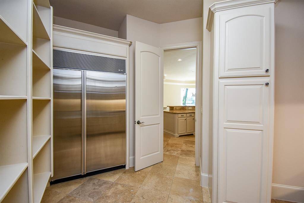 Notice the built in refrig in the secondary kitchen!