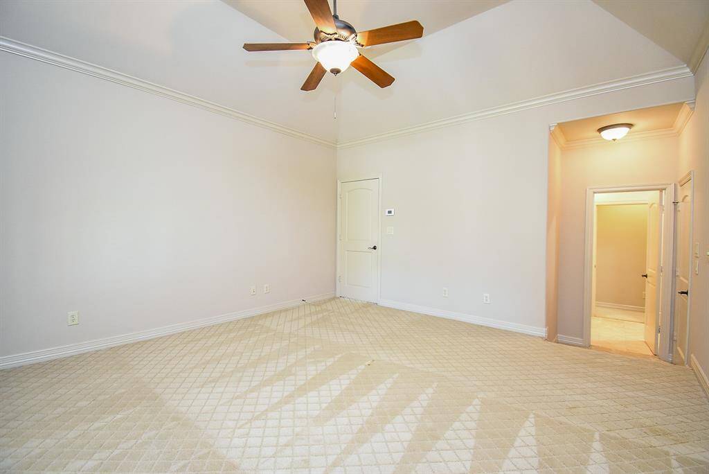 One of 4 bedrooms besides the Primary Bedroom.
