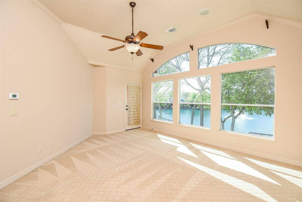 Bedroom upstairs with view of the lake.