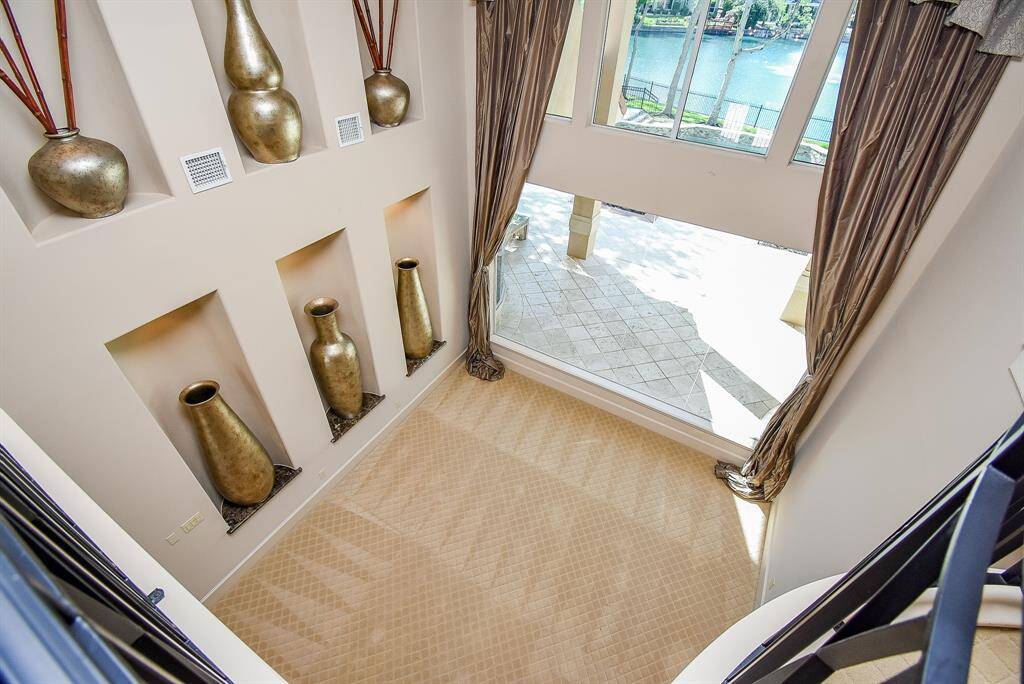 Looking down from the balcony to the living room