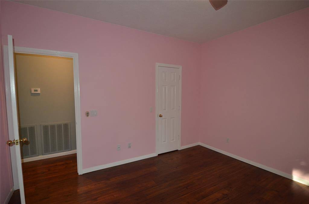 Middle bedroom with walk-in closet