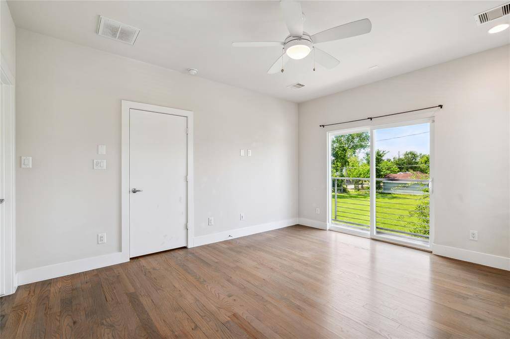 Another view of the primary bedroom.