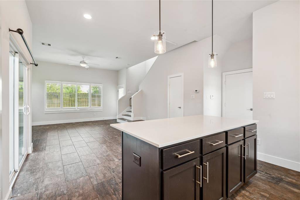 Your kitchen overlooks the dining and living room area.