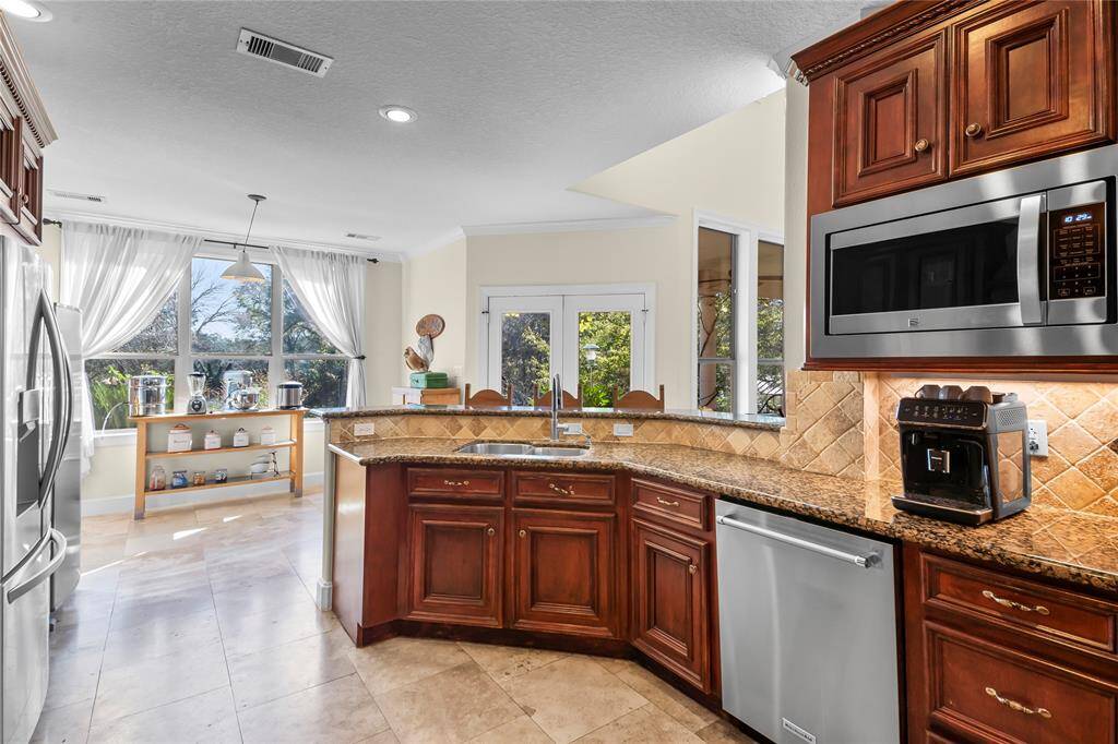 Kitchen w/ double ovens