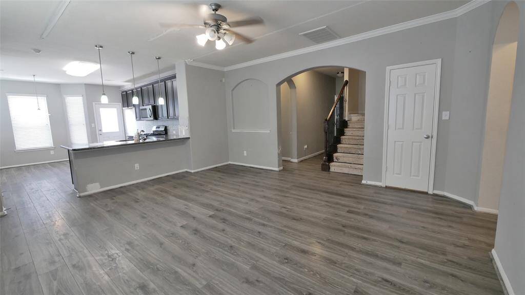 Family room looking into the kitchen and breakfast