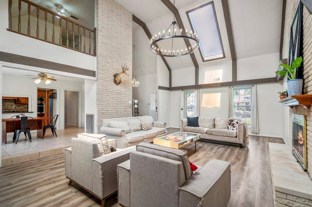 Welcome into your incredible great room with two-story soaring ceilings! 207 Greenforest is ready for move-in today. Please scroll for a tour of this incredible home.