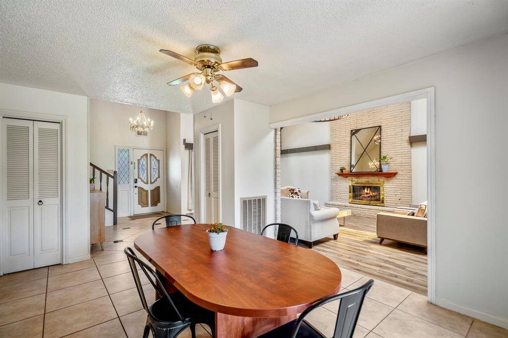 This dining room can hold a table that seats 10-12 for special occasions.