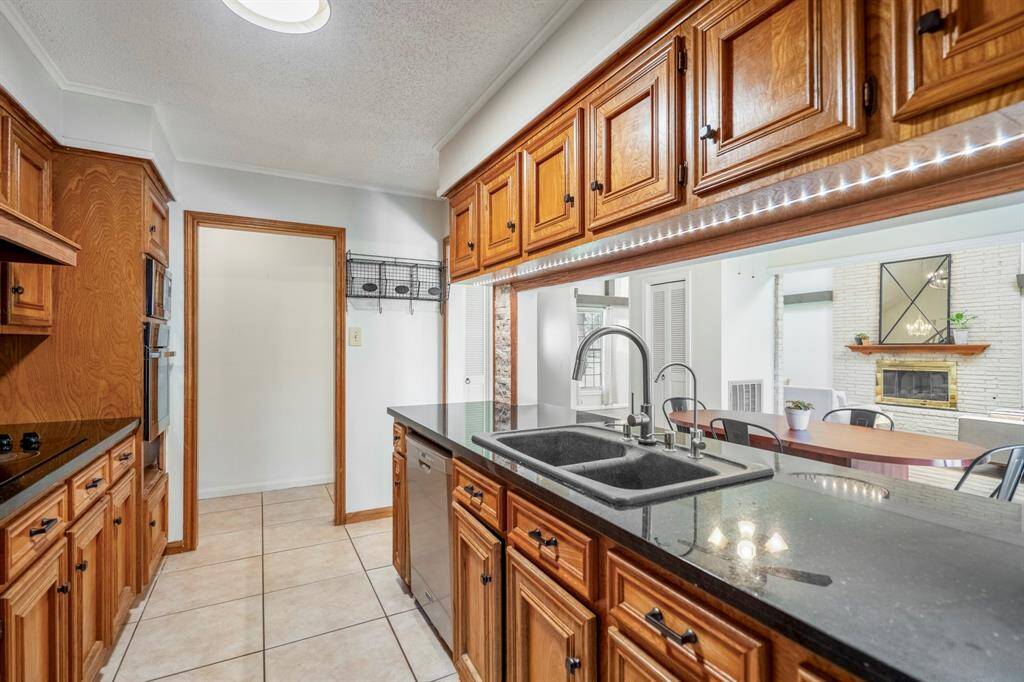 Reverse look at this kitchen as it opens into the dining space. Perfect for entertaining.