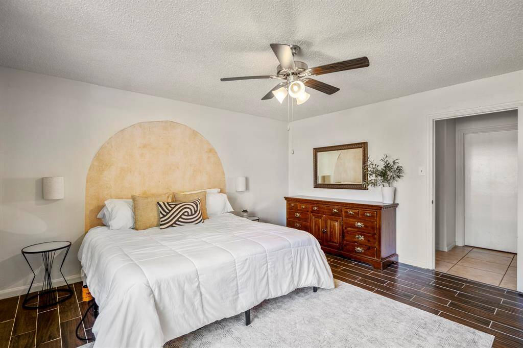 Welcome into your first floor primary bedroom with beautiful tile floors.