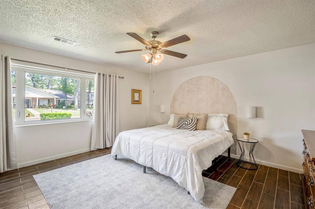 This tranquil space overlooks your front yard and is spacious enough for a king-sized bed and other large pieces of furniture.