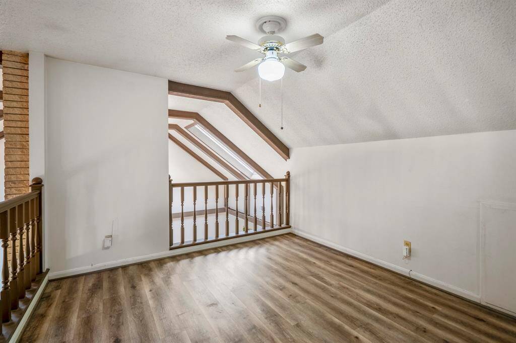 This open space is perfect for a game room, work out space, home office, or media room.