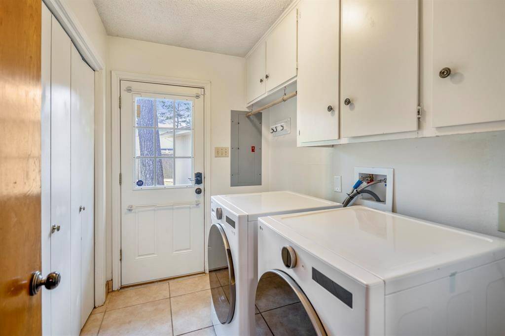 First floor utility room that also leads you to the backyard and garage.